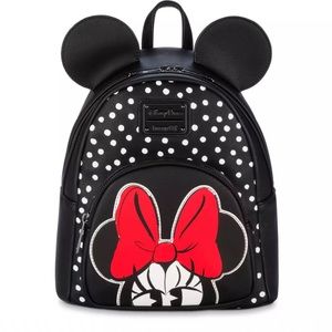 Brand new from Disney Park. NWT. Black, red and  white. Minnie Mouse Loungefly